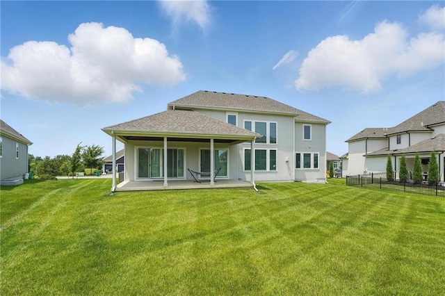 17137 Barton St, Overland Park, KS 66221 - rear view of house featuring a patio