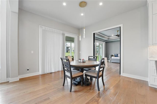 17137 Barton St, Overland Park, KS 66221 - dining room featuring light wood finished floors, recessed lighting, and baseboards