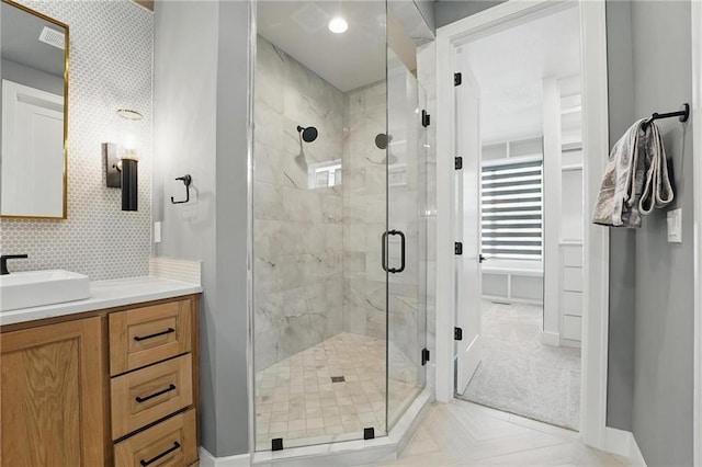 17137 Barton St, Overland Park, KS 66221 - bathroom with a stall shower, vanity, and baseboards