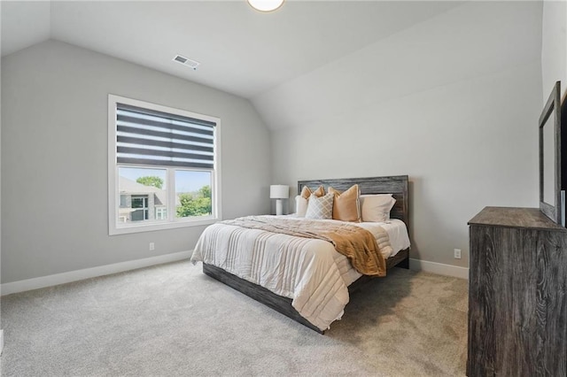17137 Barton St, Overland Park, KS 66221 - bedroom with vaulted ceiling, carpet flooring, and baseboards