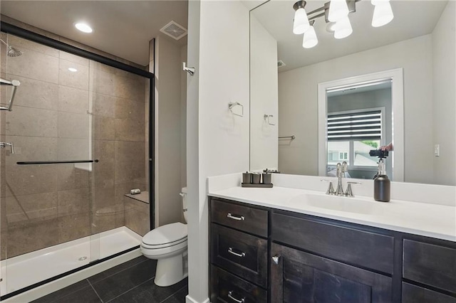 17137 Barton St, Overland Park, KS 66221 - bathroom with toilet, tile patterned flooring, and a stall shower