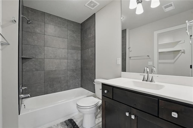 17137 Barton St, Overland Park, KS 66221 - full bath featuring toilet, vanity, and tub / shower combination