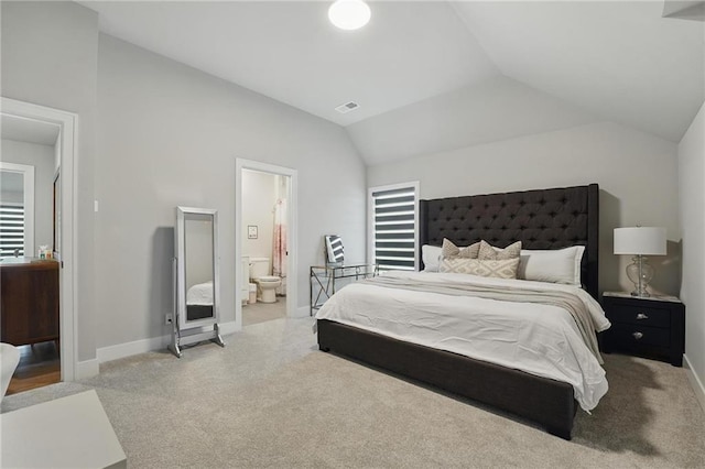 17137 Barton St, Overland Park, KS 66221 - bedroom featuring vaulted ceiling, baseboards, carpet, ensuite bath, and multiple windows