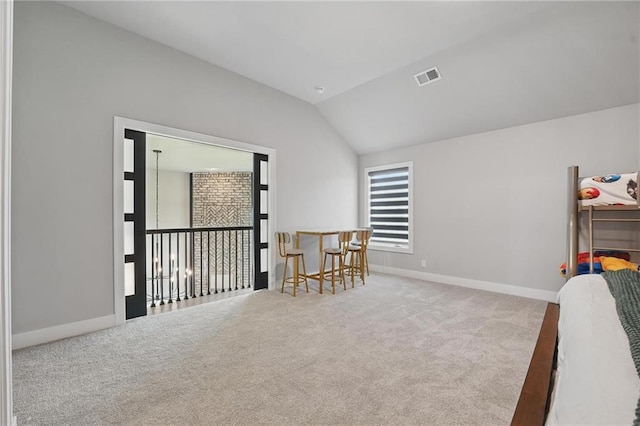 17137 Barton St, Overland Park, KS 66221 - spare room featuring carpet flooring, lofted ceiling, and baseboards