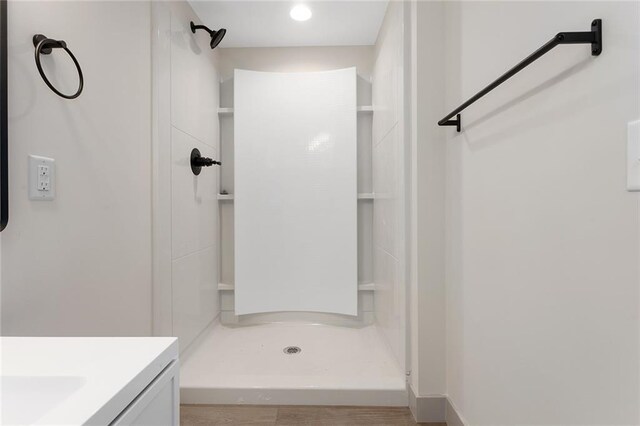 38 NW 525th Rd, Warrensburg, MO 64093 - bathroom featuring a shower stall, vanity, and recessed lighting