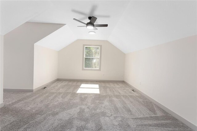 38 NW 525th Rd, Warrensburg, MO 64093 - additional living space featuring a ceiling fan, carpet, and lofted ceiling