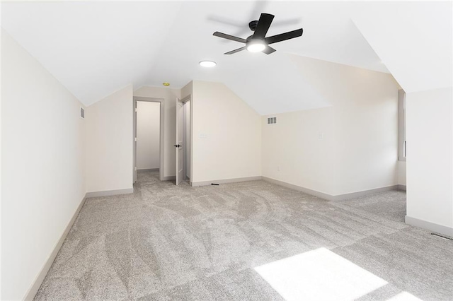 38 NW 525th Rd, Warrensburg, MO 64093 - additional living space with light colored carpet, vaulted ceiling, and a ceiling fan