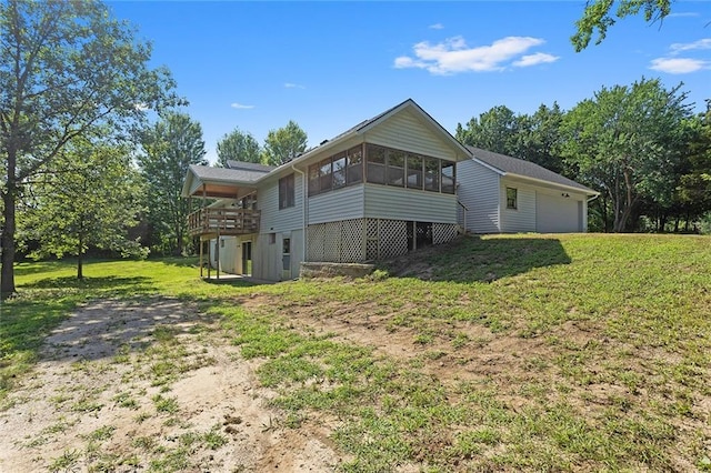 38 NW 525th Rd, Warrensburg, MO 64093 - back of property with a sunroom, a yard, and dirt driveway