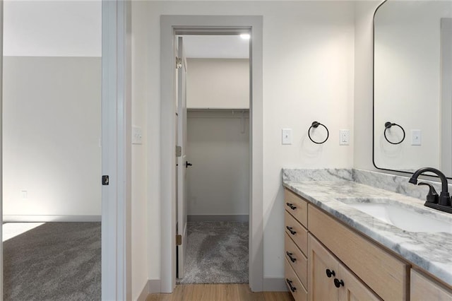 38 NW 525th Rd, Warrensburg, MO 64093 - bathroom featuring vanity and wood finished floors