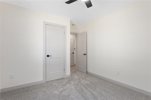 38 NW 525th Rd, Warrensburg, MO 64093 - spare room with light carpet and a ceiling fan