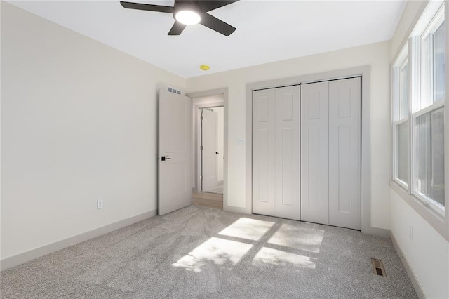 38 NW 525th Rd, Warrensburg, MO 64093 - unfurnished bedroom featuring carpet, a closet, and ceiling fan