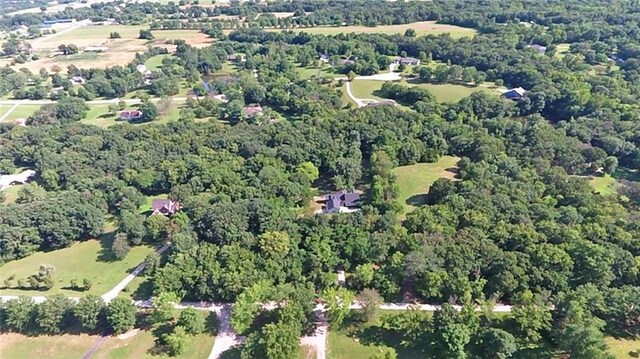 38 NW 525th Rd, Warrensburg, MO 64093 - aerial view of property and surrounding area with a forest