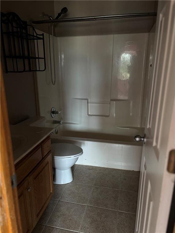 952 NW Maplewood Ct, Grain Valley, MO 64029 - bathroom featuring toilet, tile patterned flooring, vanity, and bathtub / shower combination