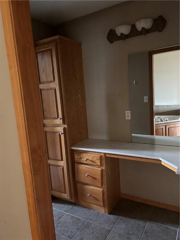 952 NW Maplewood Ct, Grain Valley, MO 64029 - bathroom with tile patterned floors and vanity