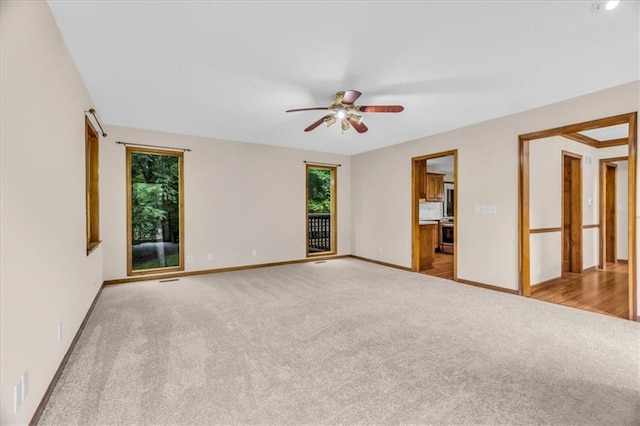 4506 NW Apache Dr, Riverside, MO 64150 - carpeted empty room featuring ceiling fan and baseboards