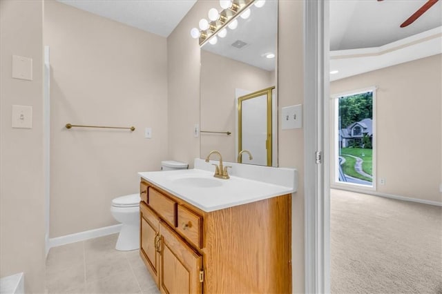 4506 NW Apache Dr, Riverside, MO 64150 - bathroom with vanity, toilet, a shower with shower door, and baseboards