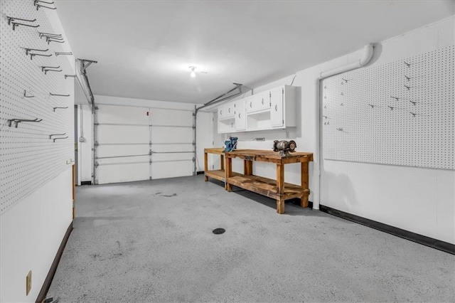 4506 NW Apache Dr, Riverside, MO 64150 - garage featuring a workshop area
