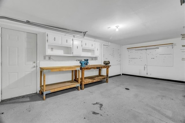 4506 NW Apache Dr, Riverside, MO 64150 - garage featuring a workshop area