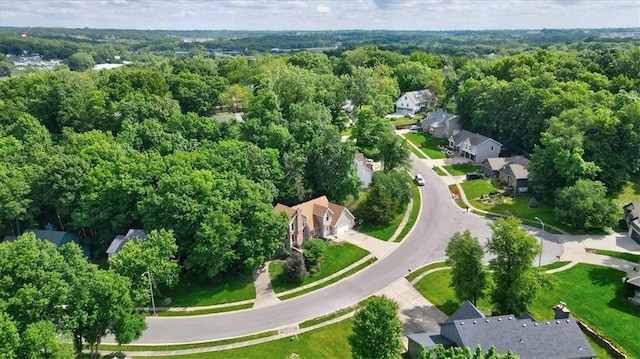 4506 NW Apache Dr, Riverside, MO 64150 - aerial view of property and surrounding area featuring nearby suburban area and a heavily wooded area