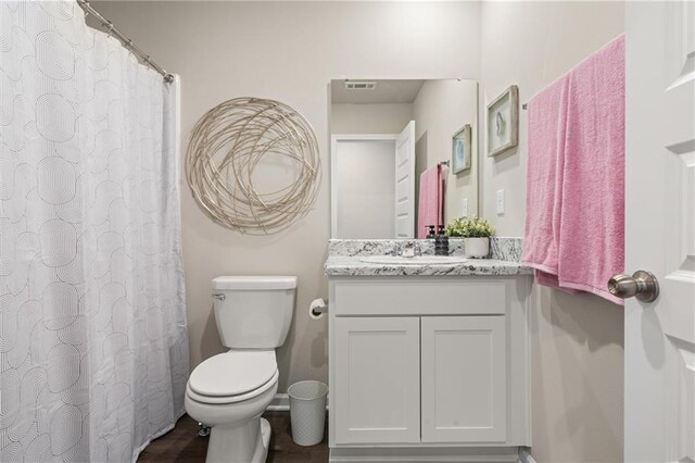37838 W 208th Ter, Edgerton, KS 66021 - full bath featuring toilet, vanity, and wood finished floors