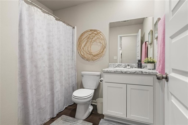 37838 W 208th Ter, Edgerton, KS 66021 - bathroom with toilet, vanity, and wood finished floors