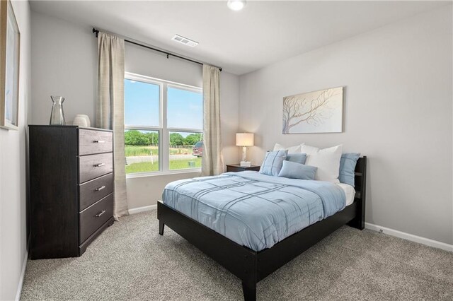 37838 W 208th Ter, Edgerton, KS 66021 - bedroom featuring light carpet and baseboards