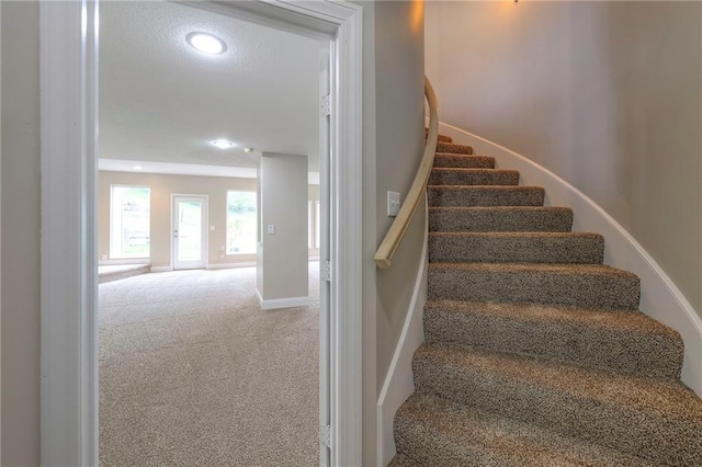5706 NE Sapphire Pl, Lees Summit, MO 64064 - stairs with carpet flooring, baseboards, and recessed lighting