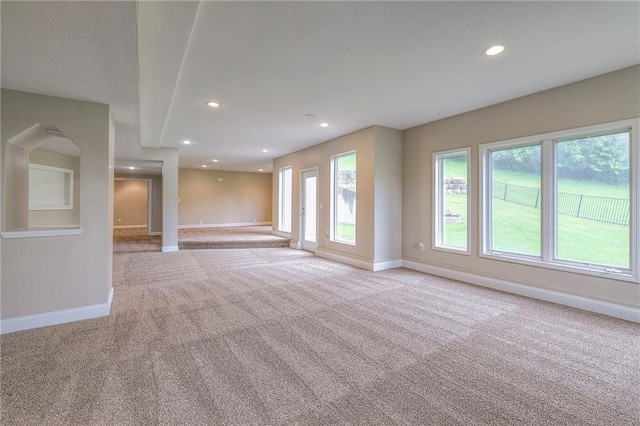 5706 NE Sapphire Pl, Lees Summit, MO 64064 - carpeted empty room with baseboards and recessed lighting