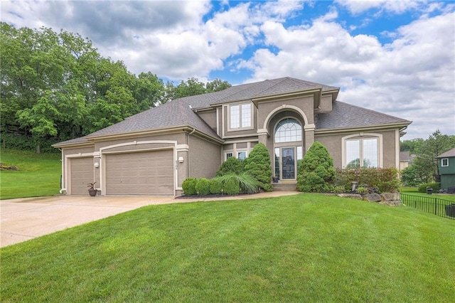 5706 NE Sapphire Pl, Lees Summit, MO 64064 - view of front of property featuring concrete driveway, a garage, stucco siding, and roof with shingles