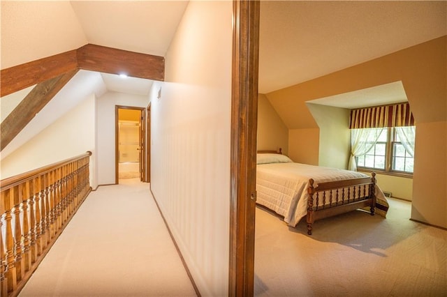 401 E 129th Ter, Kansas City, MO 64145 - carpeted bedroom featuring lofted ceiling and ensuite bath