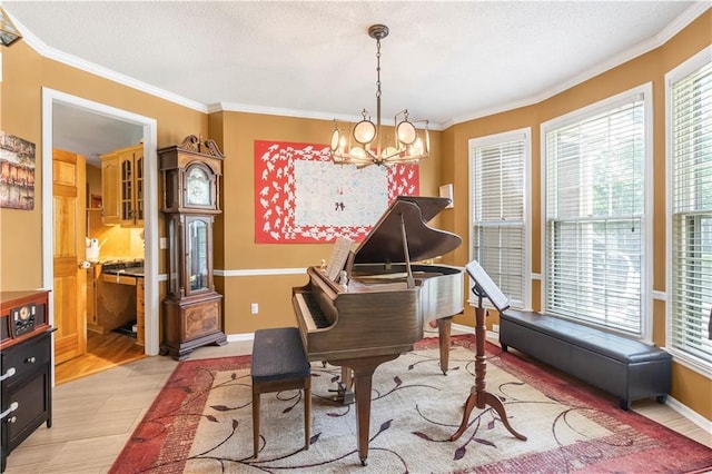 11415 Oakview Dr, Lenexa, KS 66215 - living area featuring a chandelier, crown molding, a textured ceiling, baseboards, and light wood-style floors