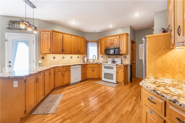 11415 Oakview Dr, Lenexa, KS 66215 - kitchen with white appliances, a sink, light stone countertops, light wood-style flooring, and backsplash