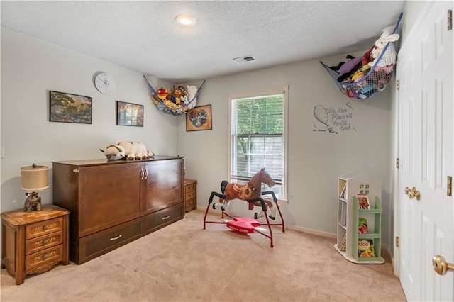 11415 Oakview Dr, Lenexa, KS 66215 - bedroom with light colored carpet, a textured ceiling, and baseboards