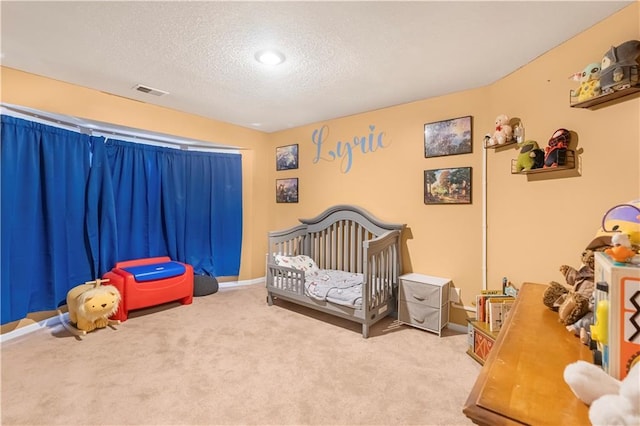 11415 Oakview Dr, Lenexa, KS 66215 - bedroom with a textured ceiling, carpet, a nursery area, and baseboards