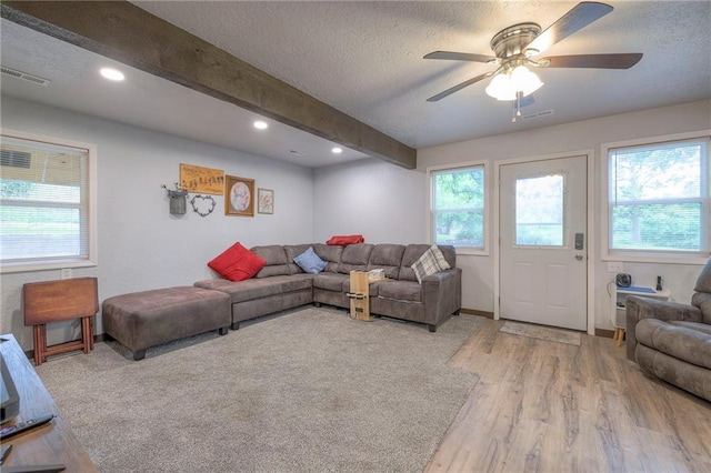 25801 E 317th Ter, Harrisonville, MO 64701 - living area with light wood-style flooring, a ceiling fan, a textured ceiling, beamed ceiling, and recessed lighting