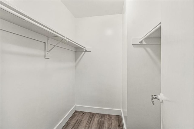 600 E 8th St Unit 6N, Kansas City, MO 64106 - walk in closet featuring dark wood-style flooring