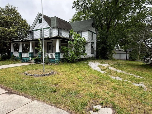 1202 Wall St, Galena, KS 66739 - view of front of house with covered porch and a front yard
