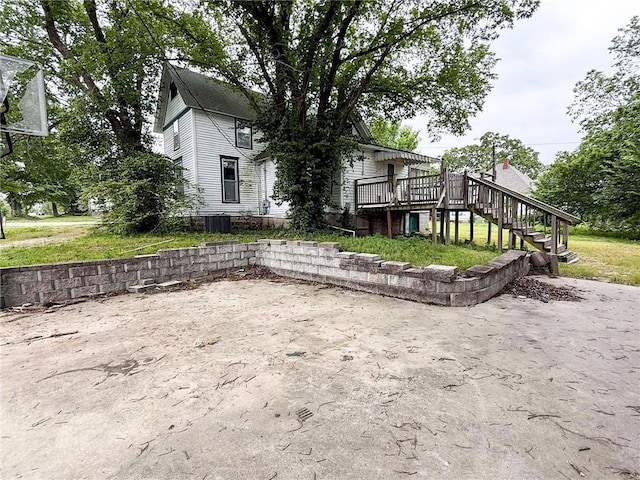 1202 Wall St, Galena, KS 66739 - view of front of property featuring stairway and a deck