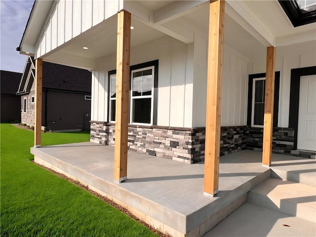 805 W Solomon Dr, Lone Jack, MO 64086 - covered porch with a lawn