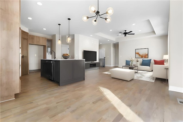 805 W Solomon Dr, Lone Jack, MO 64086 - living area featuring a chandelier, light wood-style flooring, baseboards, and recessed lighting