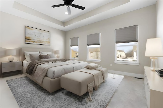 805 W Solomon Dr, Lone Jack, MO 64086 - bedroom with light colored carpet, a raised ceiling, baseboards, and ceiling fan