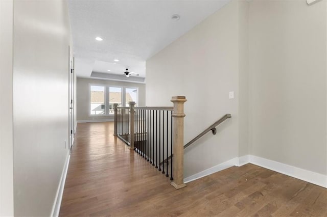 805 W Solomon Dr, Lone Jack, MO 64086 - corridor featuring an upstairs landing, baseboards, wood finished floors, and recessed lighting