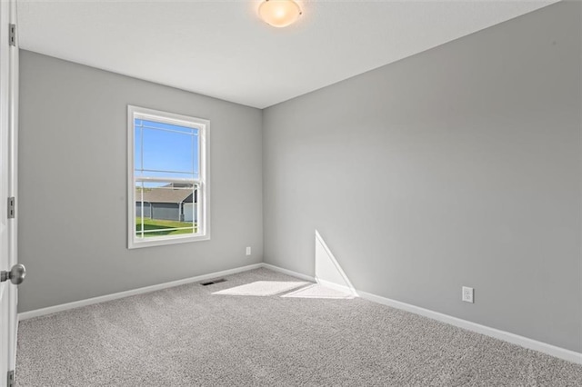 11207 207th St, Peculiar, MO 64078 - empty room with carpet and baseboards