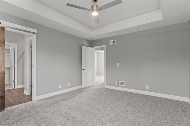 11207 207th St, Peculiar, MO 64078 - unfurnished room featuring carpet flooring, a tray ceiling, crown molding, ceiling fan, and baseboards