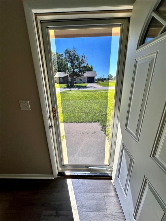 1710 Halsey Ave, Independence, KS 67301 - doorway to outside with baseboards