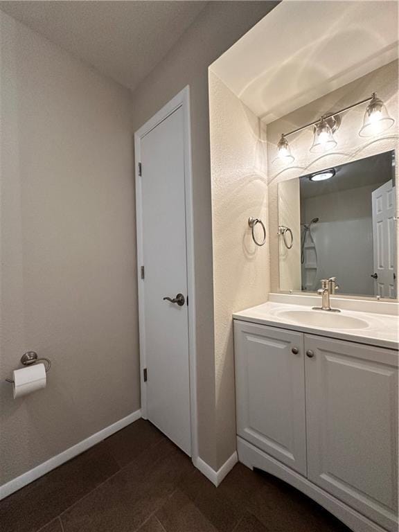 1710 Halsey Ave, Independence, KS 67301 - bathroom with vanity and baseboards