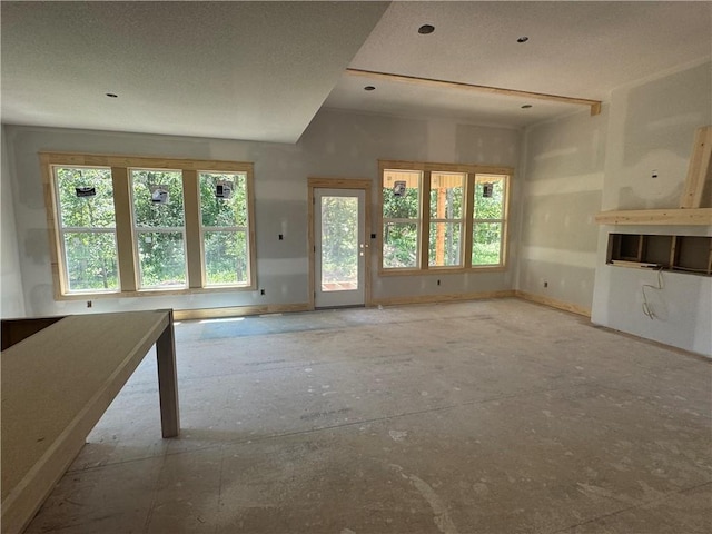 303 SW 17th St, Oak Grove, MO 64029 - unfurnished living room with plenty of natural light