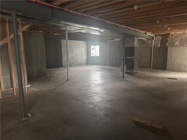 303 SW 17th St, Oak Grove, MO 64029 - below grade area with heating unit