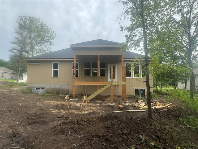 303 SW 17th St, Oak Grove, MO 64029 - rear view of property with a shingled roof and stairs