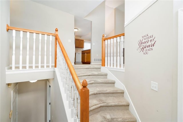 706 E 15th St E, Eudora, KS 66025 - stairs featuring baseboards